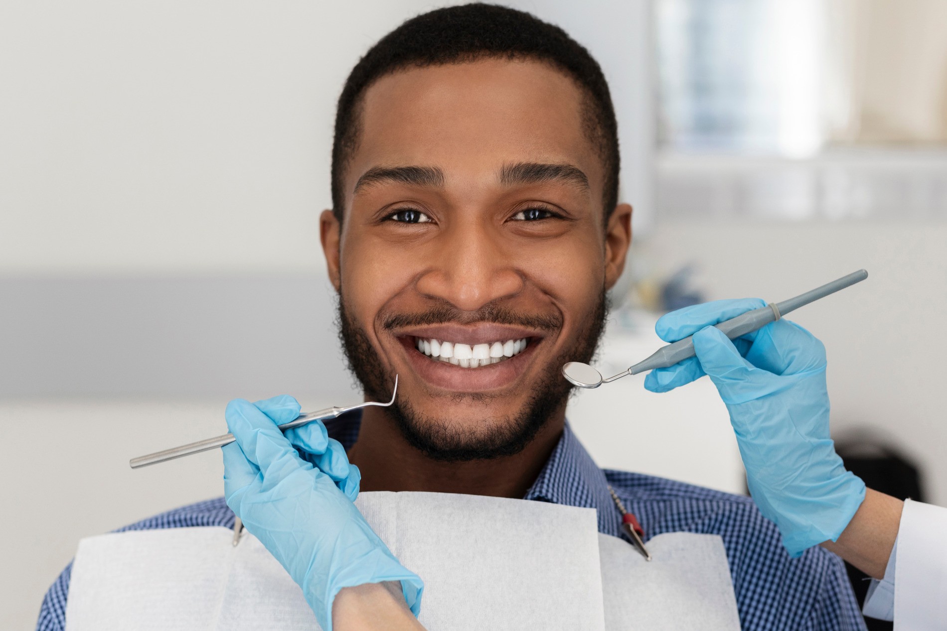 Man at his cosmetic dental bonding appointment in Fargo ND