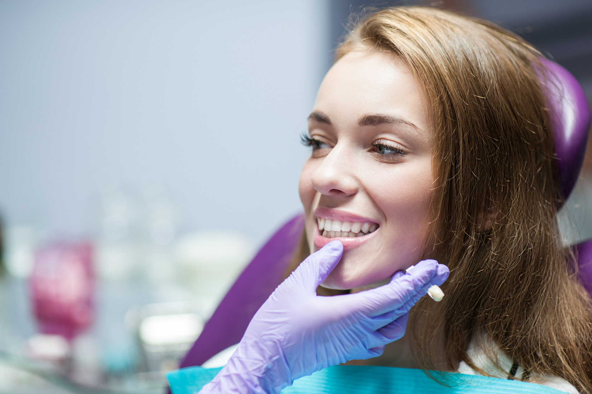 Woman getting same day crowns with Dr. West-Roehl in Fargo ND