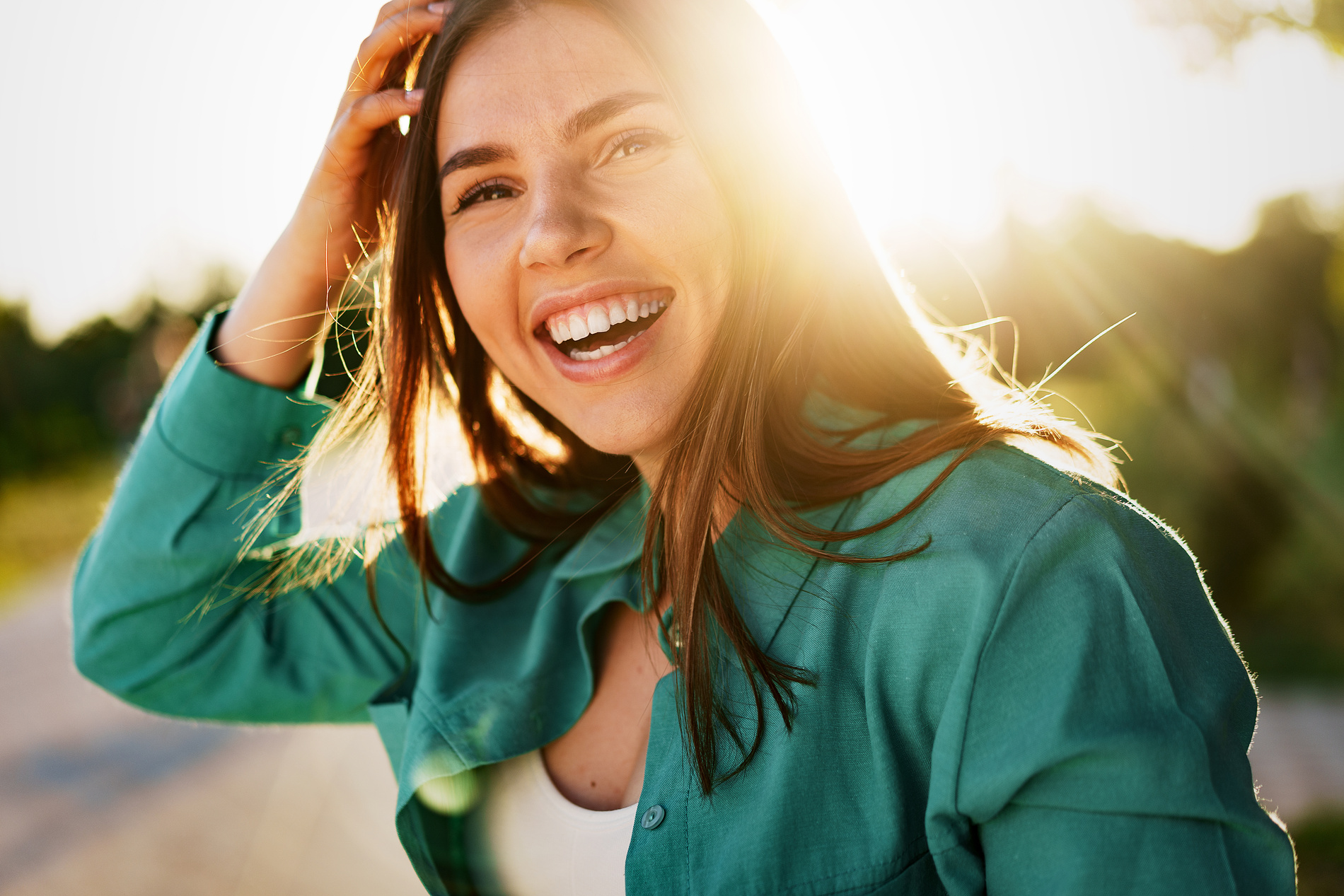 Woman smiling after top cosmetic dental treatments in FArgo ND